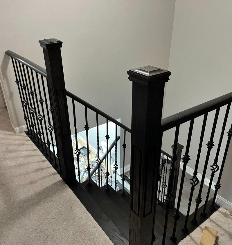 Stylish hardwood stair renovation in a modern home